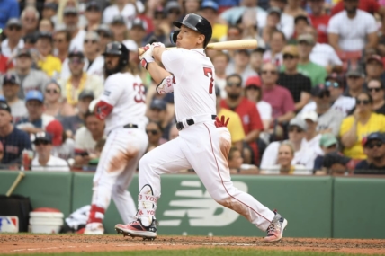 Jul 9, 2023; Boston, Massachusetts, USA;  Boston Red Sox designated hitter Masataka Yoshida (7) hits a home run during the eighth inning against the Oakland Athletics at Fenway Park. Mandatory Credit: Bob DeChiara-USA TODAY Sports